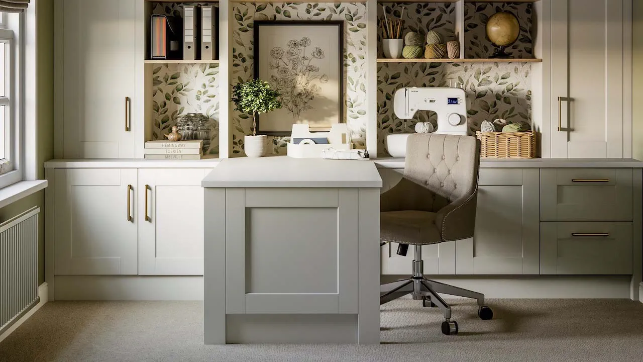 A compact home office corner with a small desk, a closed storage cabinet, and neatly managed cables in a tiny neutral room
